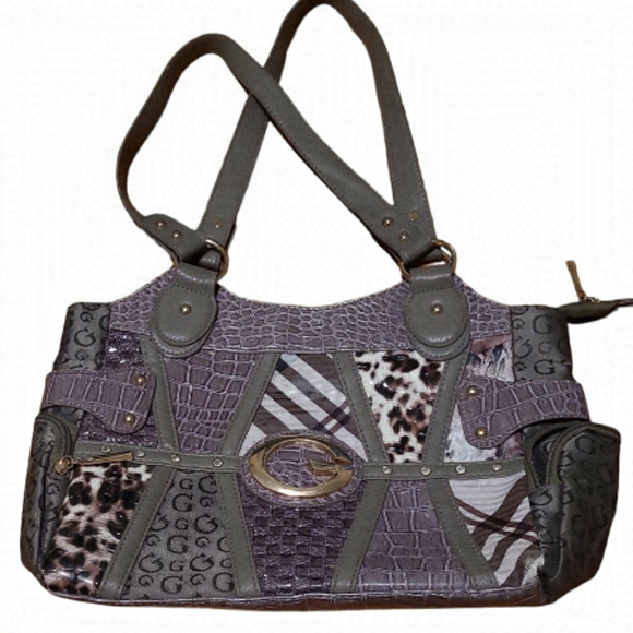 Guess Handbags - Gussachi Handbag with double straps, zip-up pockets on the sides, and center